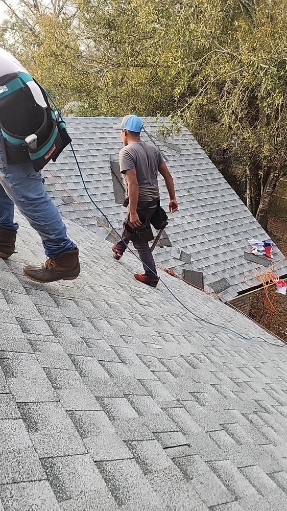 New Horizon Roofing and Exteriors crew working on a residential shingle roof install